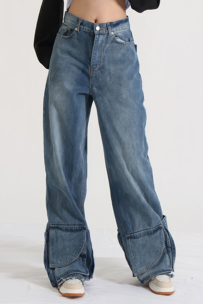 Jeans med høj talje og lommer forneden - blå
