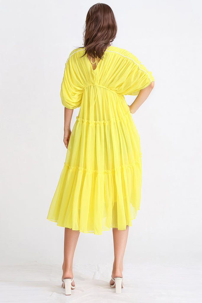 Sukienka midi ze skrzydlatymi rękawami - żółta