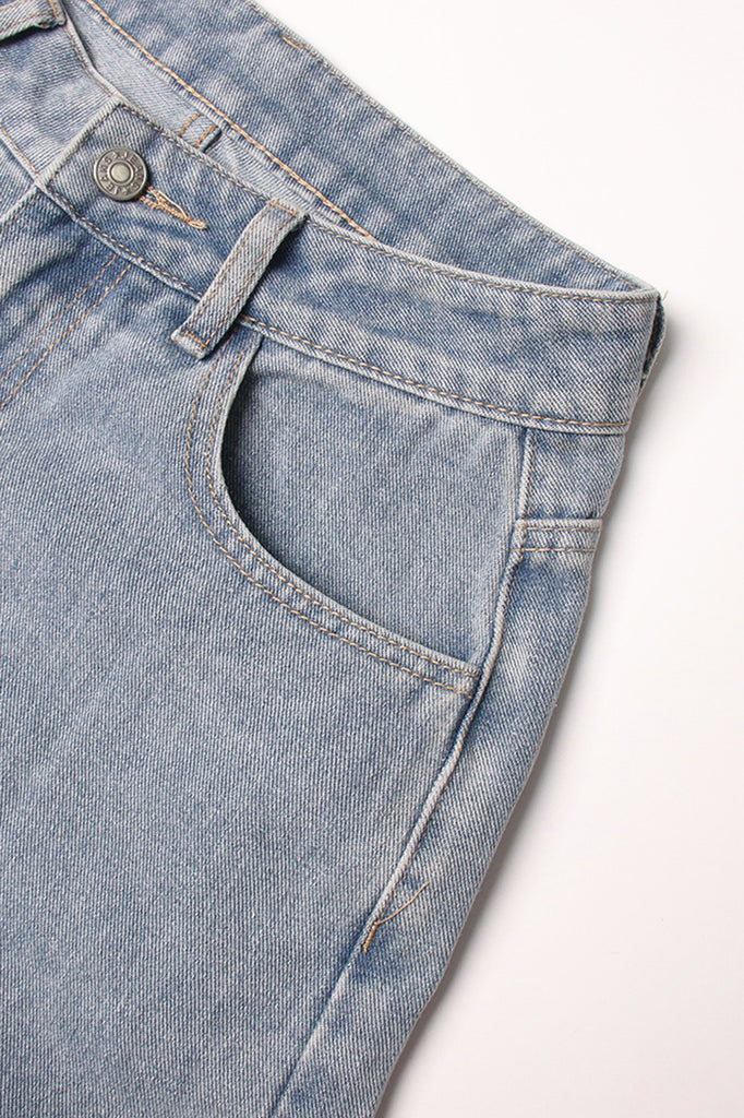 Jeans a vita alta con taglio posteriore - Blu lavato
