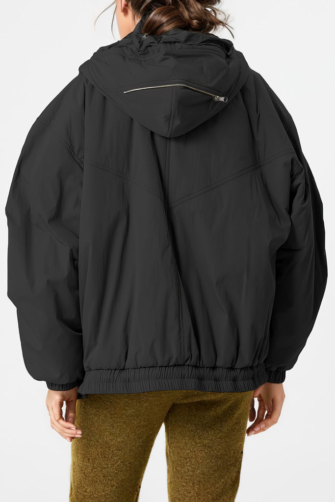 Regnafvisende jakke med hætte - sort